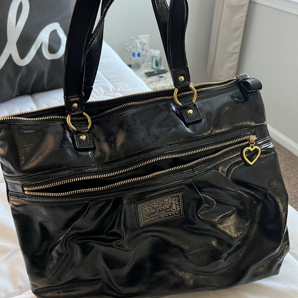 Coach black and gold handbag